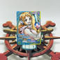 Card featuring Nami from One Piece, blue yellow op11 leader. Heroines.